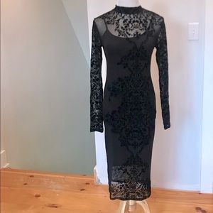 Black sheer velvet embossed Dress with liner.